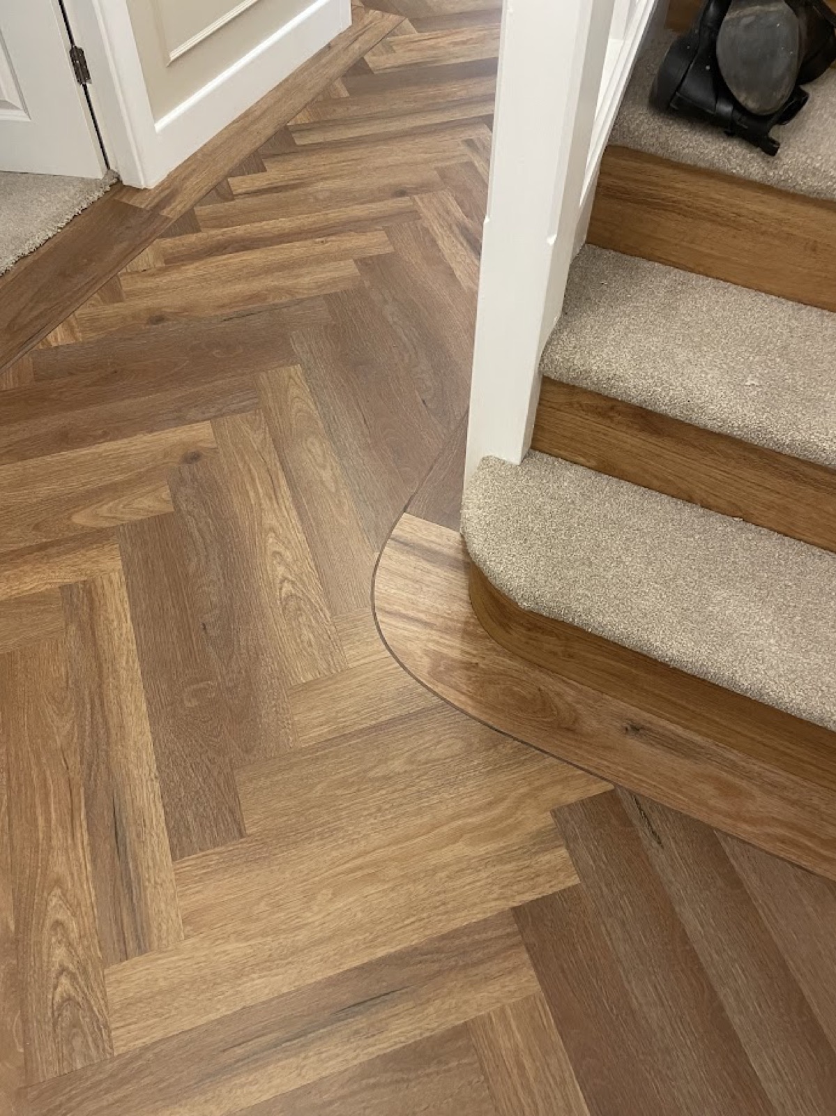 Close-up of a hand-cut LVT border detail