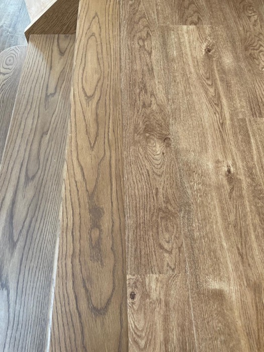 Laminate flooring fitted through a hallway