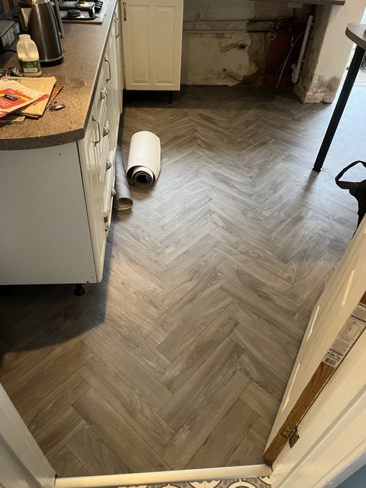 Vinyl installation by Rainbow Flooring
